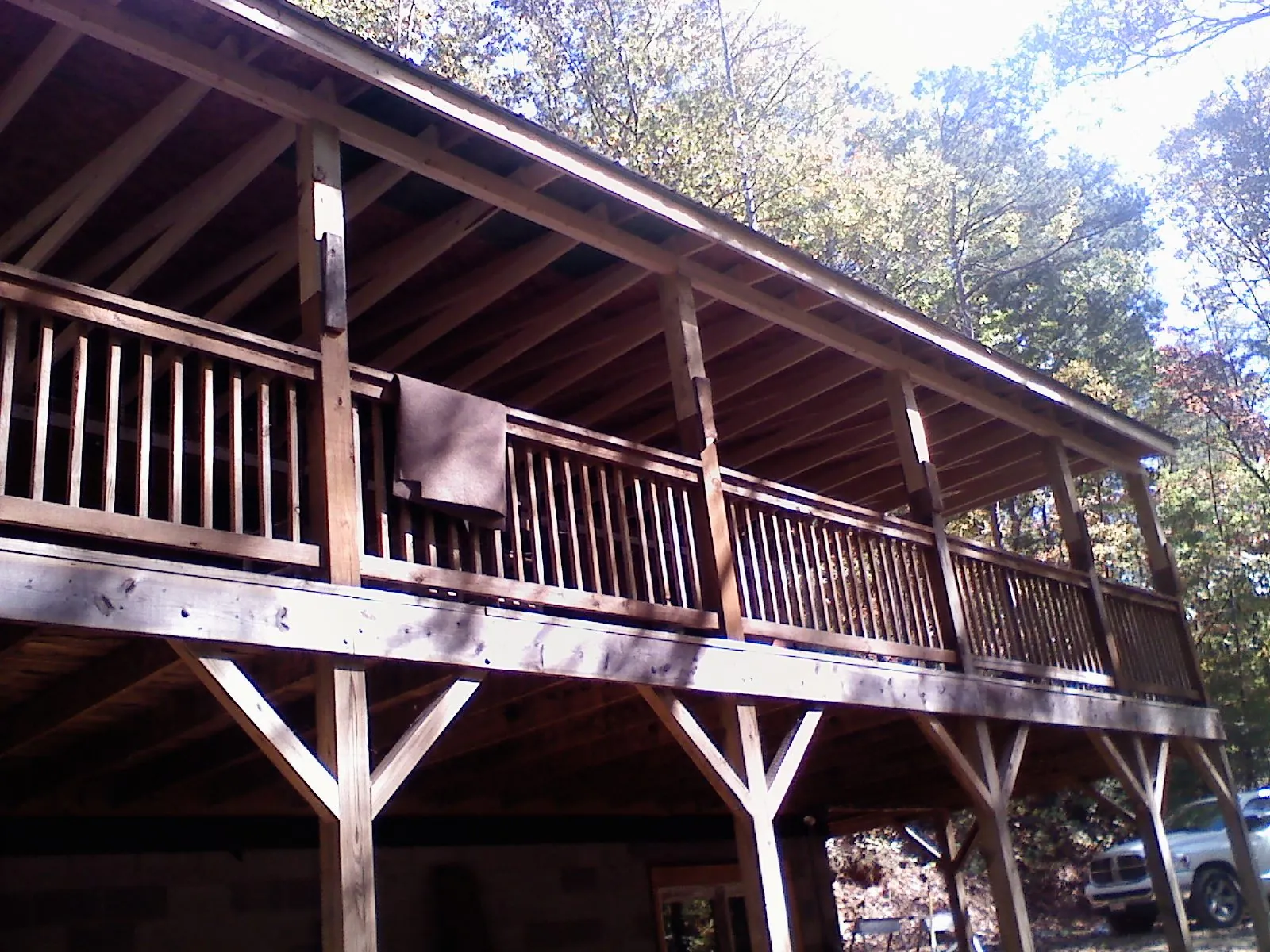 Timber framing under a new elevated porch and deck — Roof Leak Repair in Stanardsville by Roofing Brothers